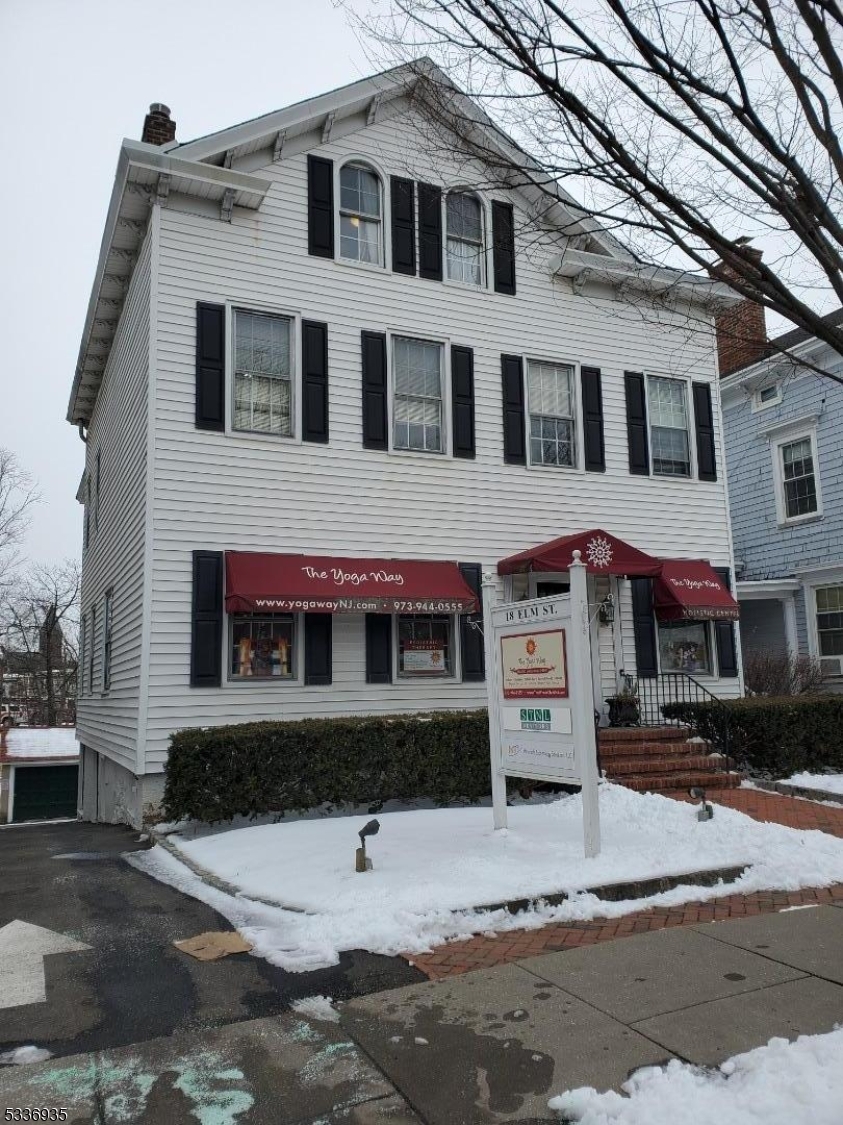 Rental unit is across front on second floor.