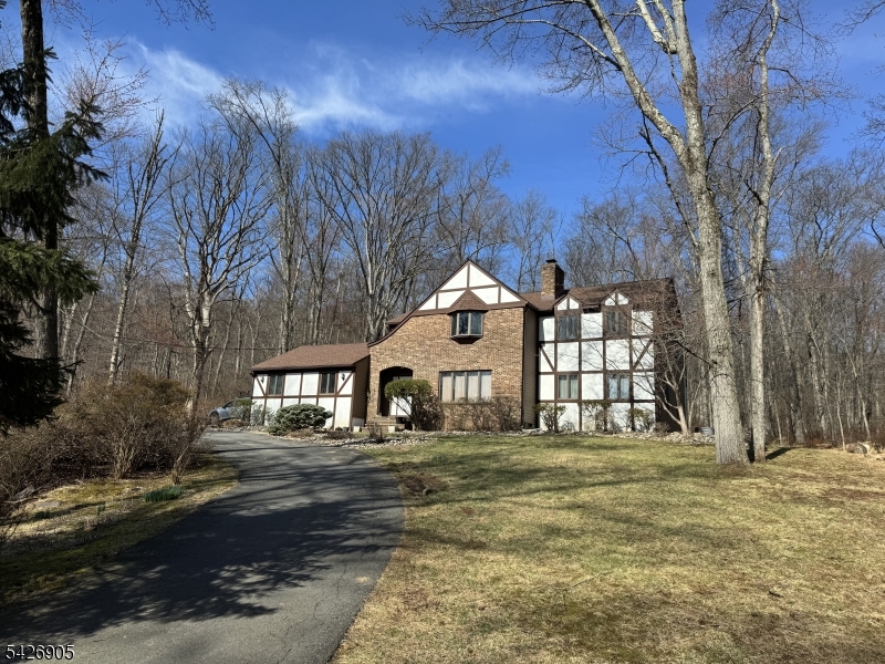 Welcome to 169 E Mountain Rd near the sought-after Sourland Preserves, where timeless comfort meets a private oasis, sitting on over an acre of land in Hillsborough Township.