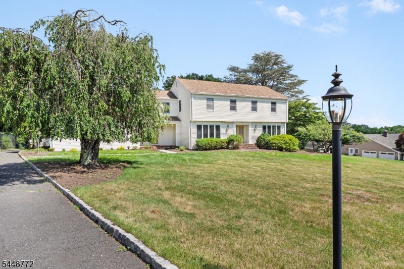Front view of this classic center hall colonial.