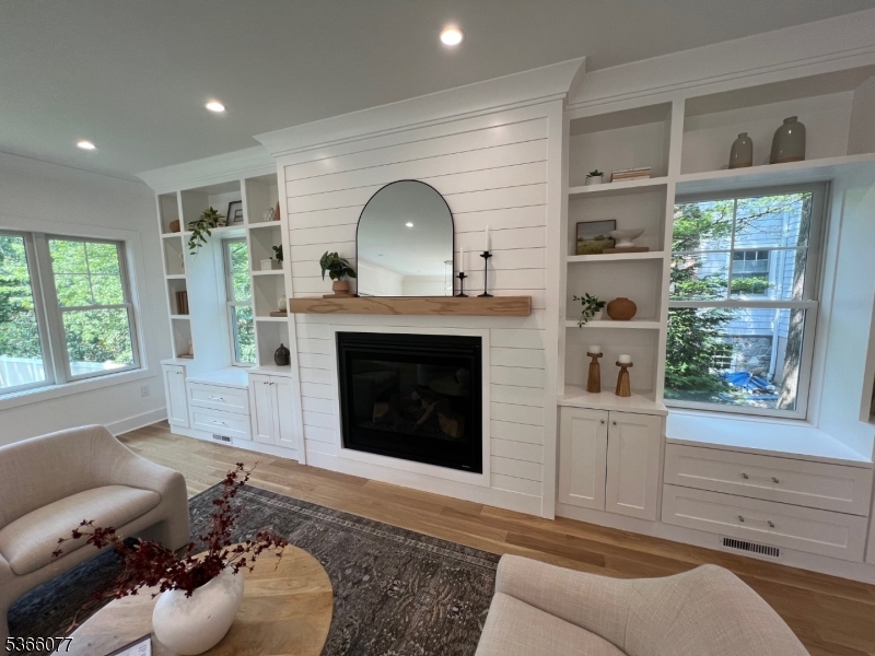Custom mantle and built  in bookcases