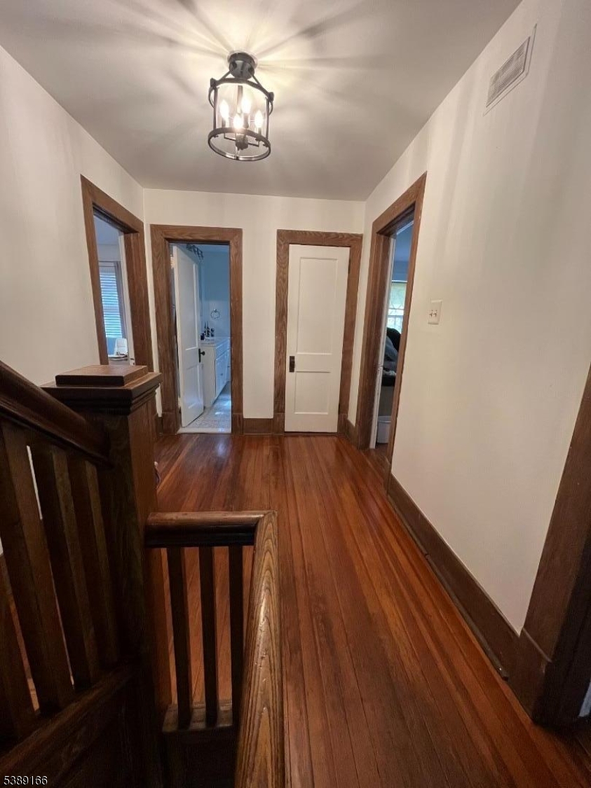 2nd fl landing Showing doors to 3 bedrooms and full bath