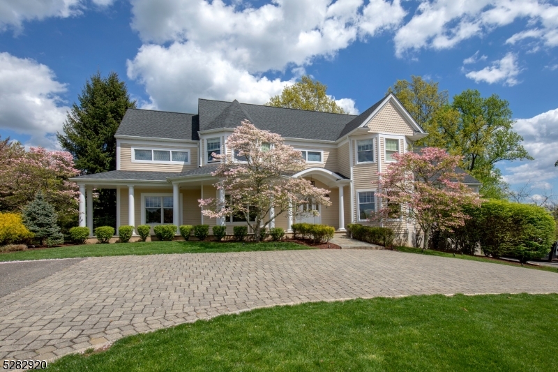 On 4 expansive lush acres in desriable Basking Ridge