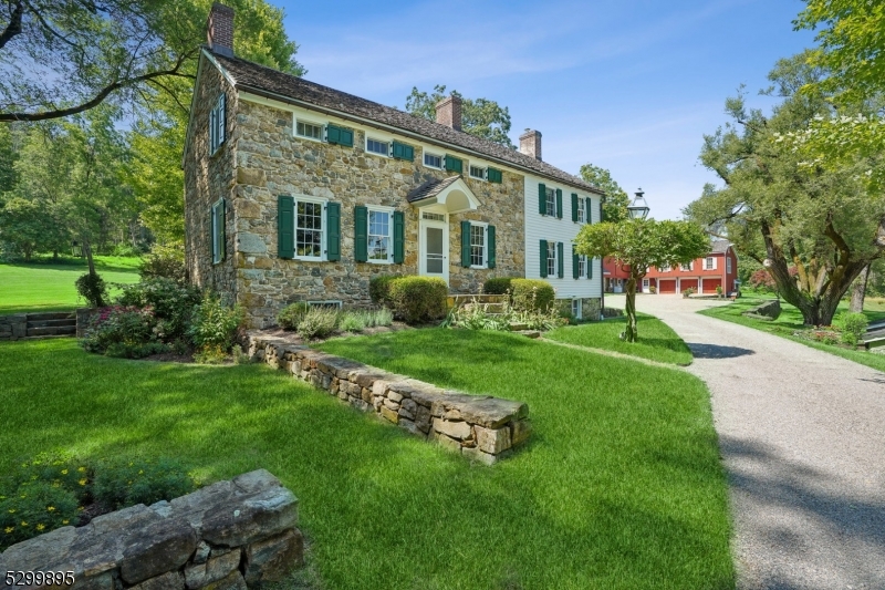 Charming approach leads to a historic homestead.