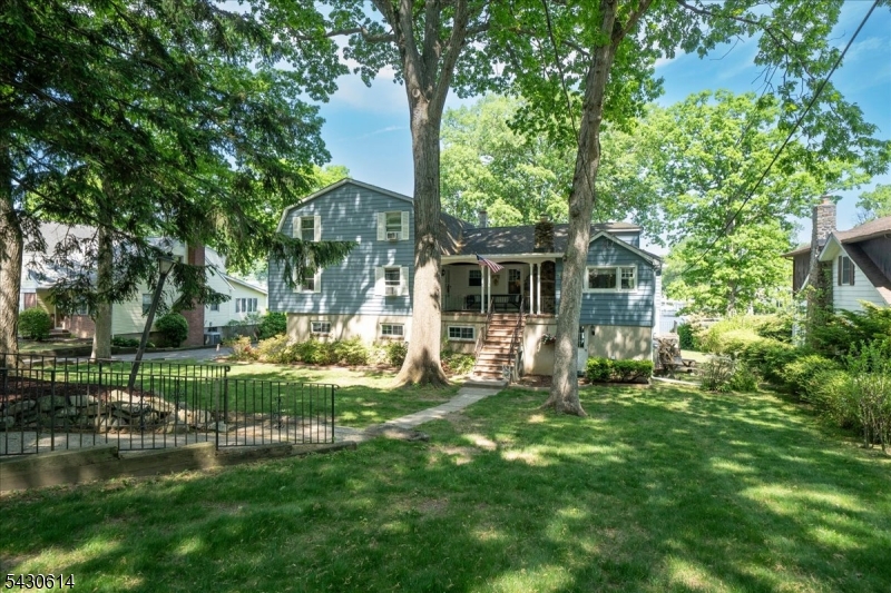 Front Exterior One of Indian Lake's most iconic lakefront homes is ready for its next chapter.
