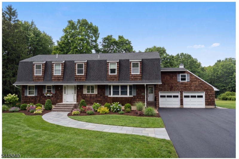 Front View PHOTO IS VIRTUALLY ENHANCED , LANDSCAPE , WALKWAY AND NWQ DRIVEWAY IS NOT INCLUDED IN SALE AND IS NOT PRESENT.