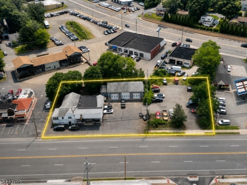 Droneview-2 bldgs w/extra lot Includes 2 buildings with vacant lot
