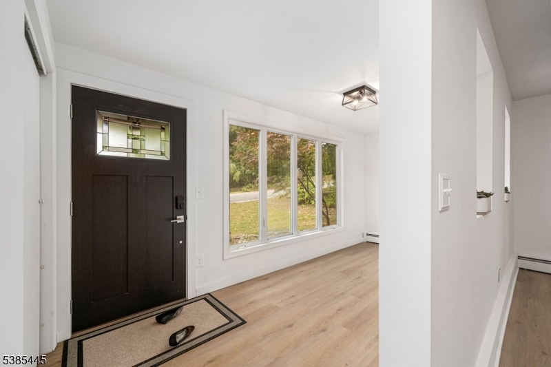 Sunroom with baseboard heat