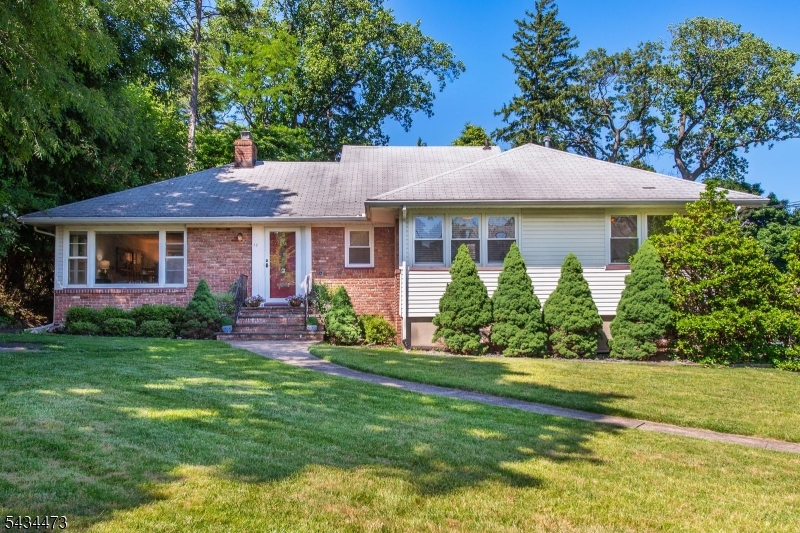 Beautifully Manicured Lawn .42 acres level lot with potential for in-ground pool in backyard- will require town approval.