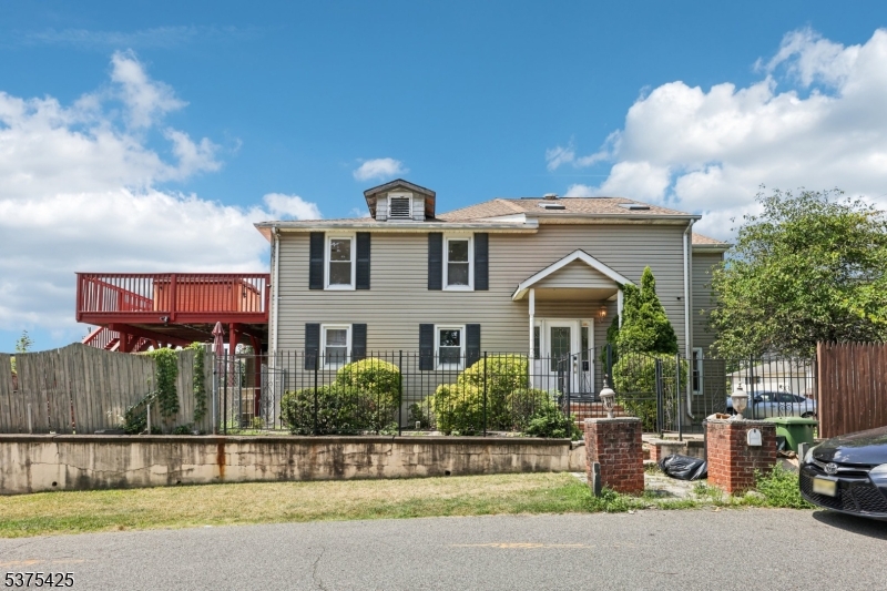 Welcome to this spacious custom home situated right on the Haledon border!