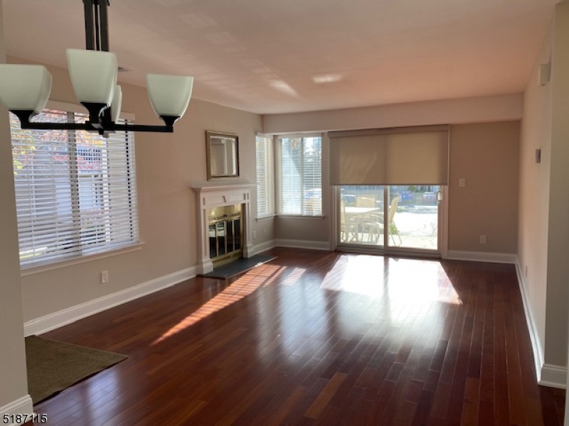 Dining room and Living room light-filled open floor concept, with Brazilian hardwood floors and custom blinds.