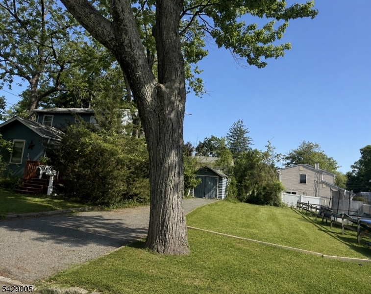 View of home & side yard