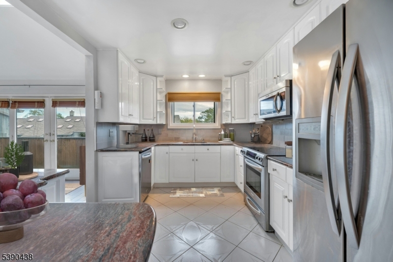 Eat-in-kitchen View of balcony