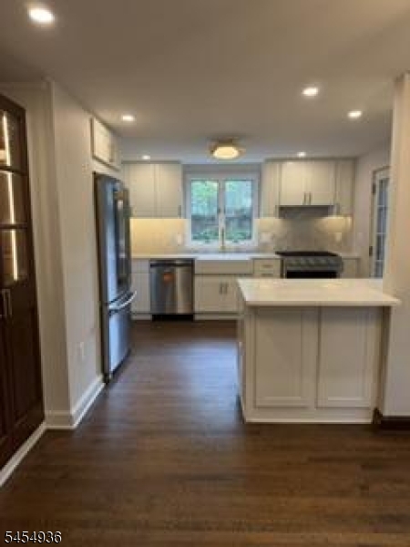 New kitchen w filtered water Custom cabinetry, new appliances, farm sink, drawer microwave, exhaust to exterior