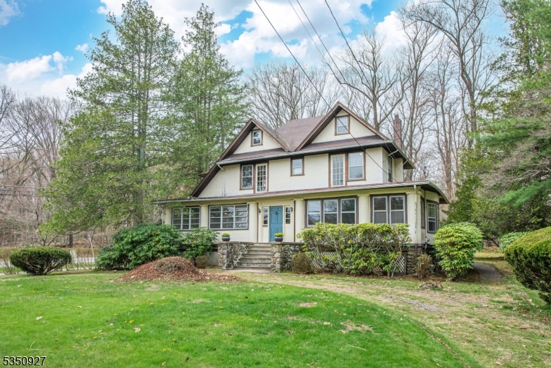Welome to this historic charmer set on a lovely, level lot with lake views across the street!