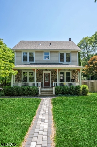Front Welcome to this Charming Center Hall Colonial