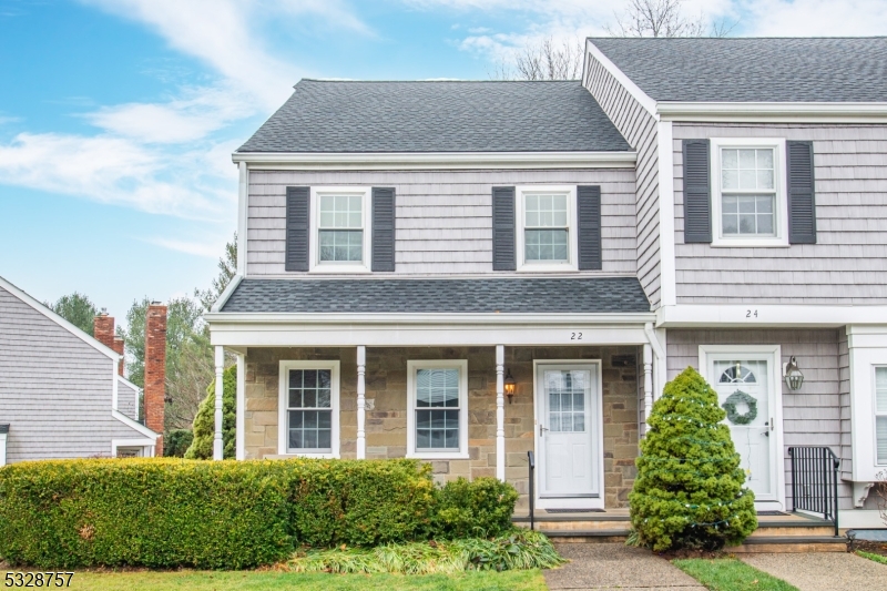 Coveted corner townhome in Mendham Commons.