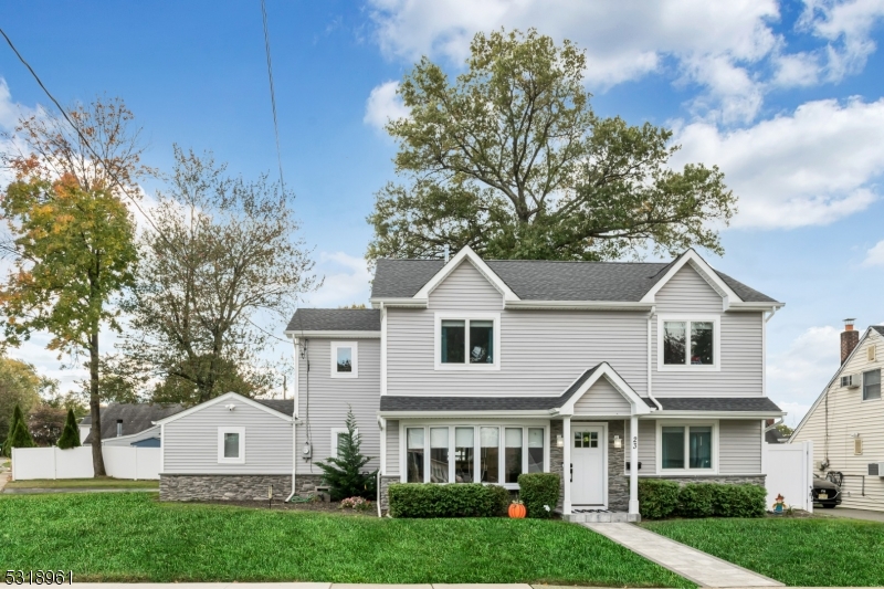 This stunning home features a perfect open floor plan that seamlessly connects living spaces, complemented by a private yard and extensive renovations, all in newer construction that promises modern elegance and comfort.