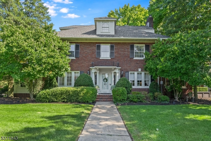 Stunning Brick Center Hall Colonial