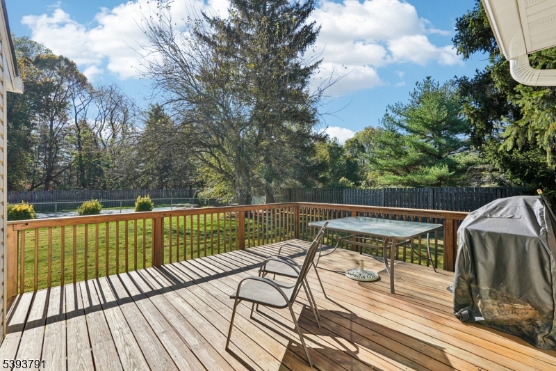 Rear Deck Enjoy al fresco dining and relaxing on the rear deck during those warm summer months.