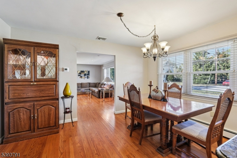 Dining Room The beautifully appointed dining room offers an ideal setting for intimate meals or hosting gatherings.