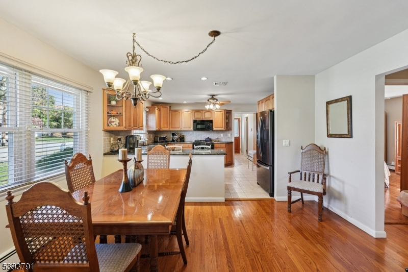 Dining Room The generous dining room offers ample space for hosting any occasion.
