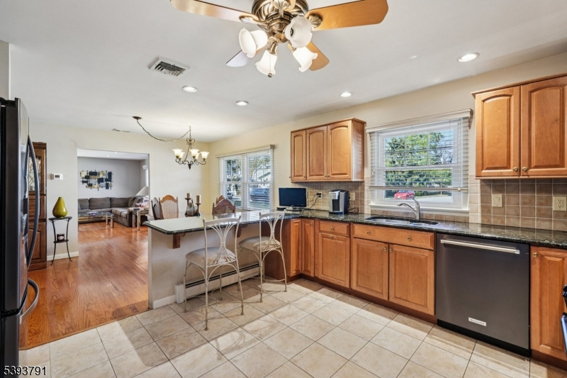 Kitchen From the dining room discover the tastefully designed eat in kitchen.