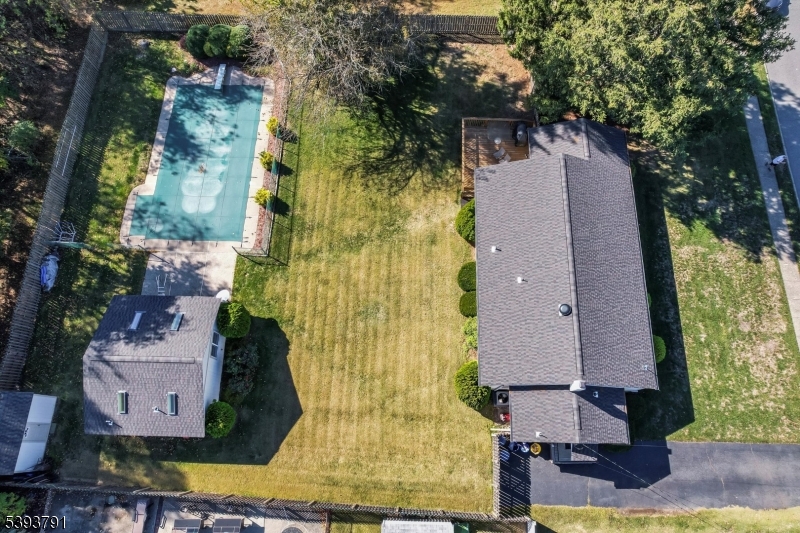 In-Ground Pool Beautiful ranch-style home situated on a level property.