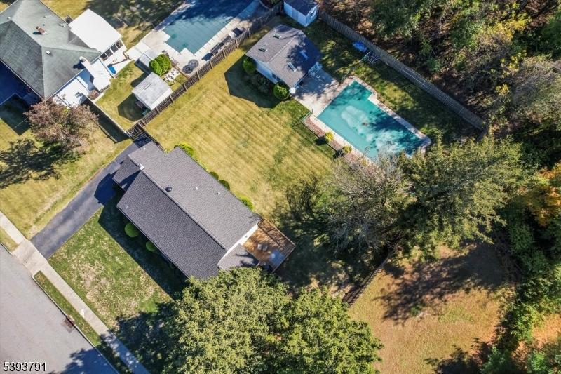Level Property with pool Ranch-style home set on a perfectly level property, complete with an inviting inground pool and a delightful pool house