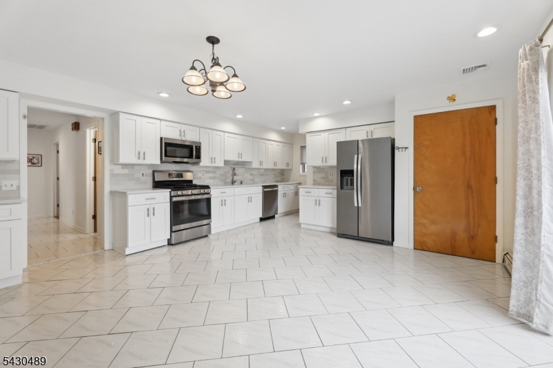 Kitchen #1 Large, Updated, EIK with SS appliances and Pantry