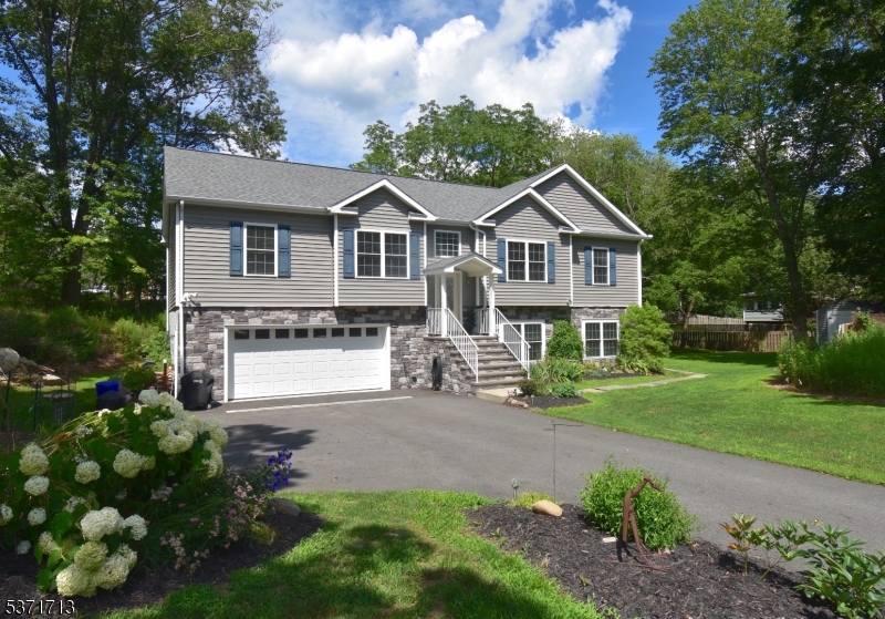 long driveway, four year old home