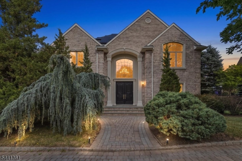 1-acre estate with circular driveway, 3-car garage and a peaceful pond. Rests atop Dey Hill on a cul-de-sac. Virtually staged