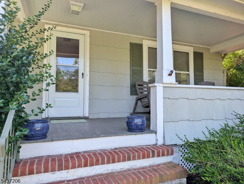 Front Porch Covered front porch of this single family home - private and cozy!