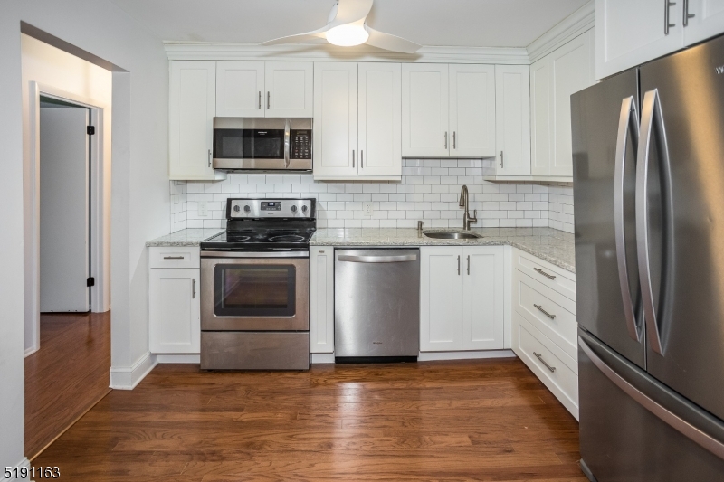 Stainless Appliances new cabinets and floors