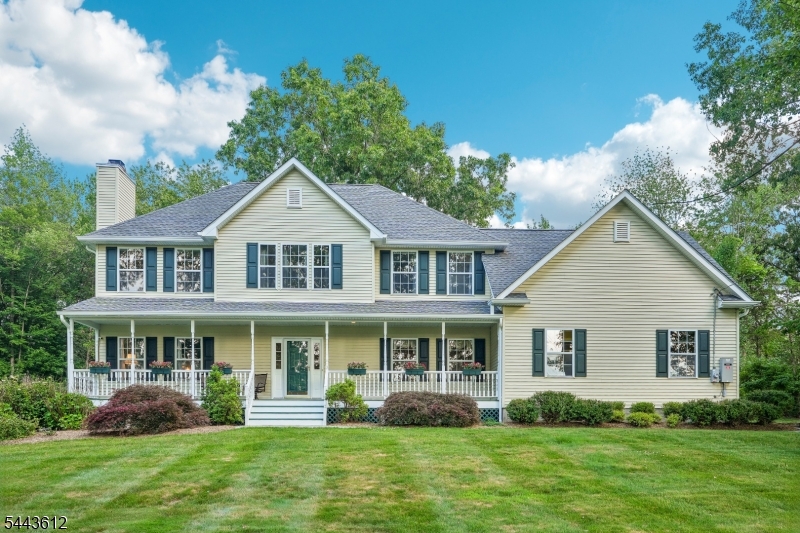 Welcome home to this beautifully maintained 4-bedroom, 2.5-bath Colonial, perfectly nestled on a private wooded lot in the heart of Andover Township.