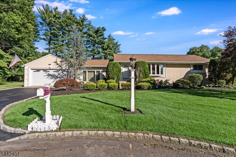Beautifully landscaped and maintained 3 BR ranch