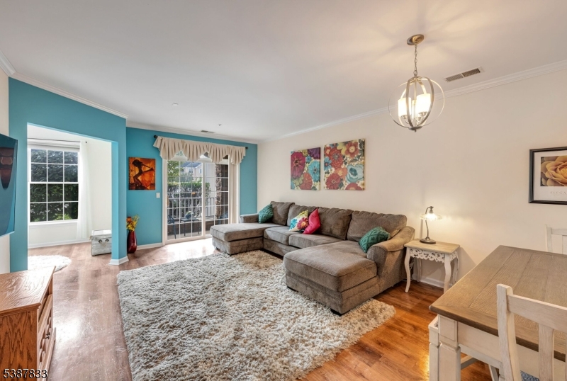 Welcome Home Cozy and bright open concept living, dining and kitchen combo.