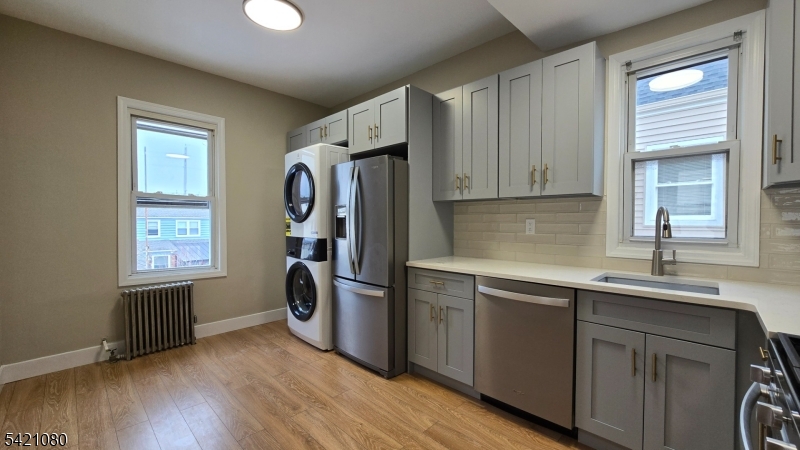 New appliances including dishwasher and laundry. Quartz countertops.