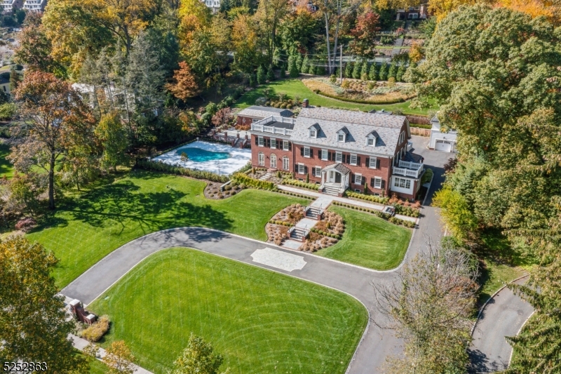 Elegantly sited in the Premier Estate Enclave of Montclair, an iconic Georgian Colonial was built in 1924 and completely renovated and re-engineered in 2019-2020.