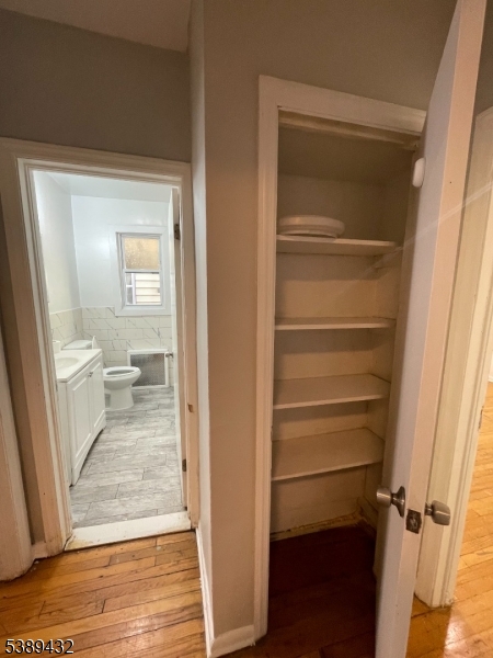 Linen Closet Adjacent to Full Linen closet to the right of the full bathroom, providing convenient storage for towels and essentials.