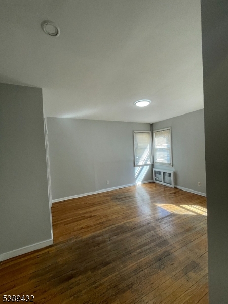 Spacious Bedroom 1 Large bedroom with ample natural light and plenty of space for furniture and storage.
