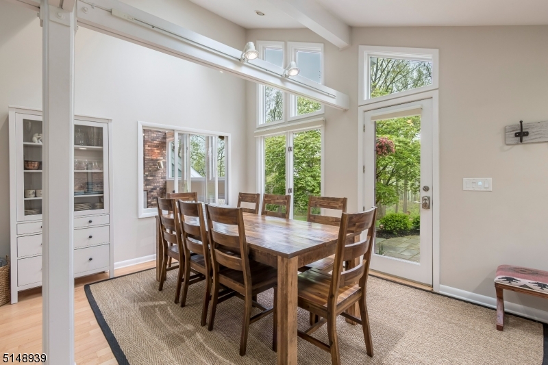 Kitchen / Dining Area has French Doors that open to a Blue Stone Patio for outdoor entertaining.
