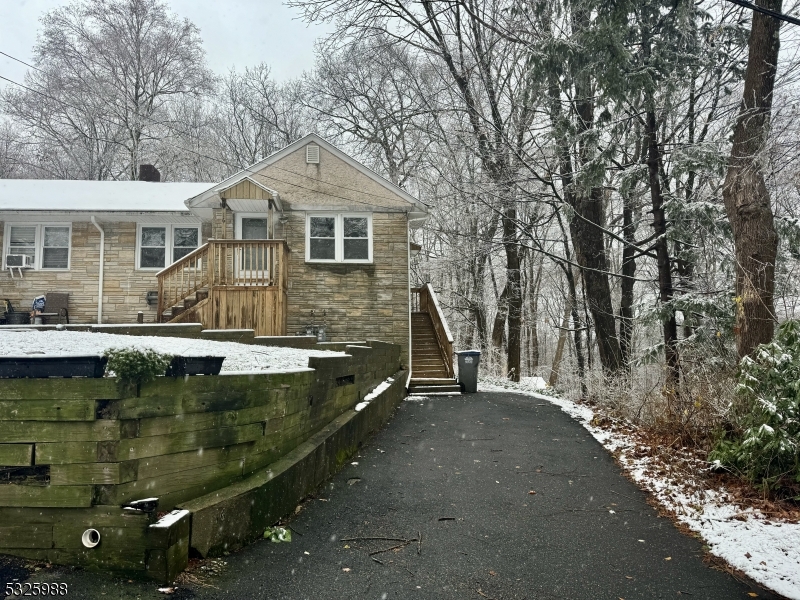 Driveway. Both front entrance & side entrance.