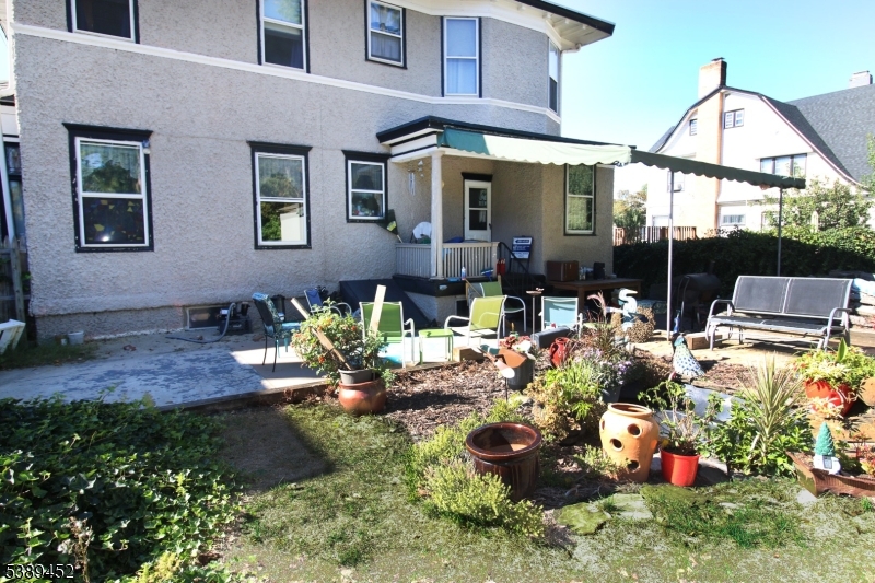 View 2 Backyard, etc Looking at the back of the house from Eastside Park.