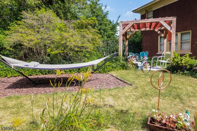 Backyard relaxation Pergola provides spot for conversation or meditation!