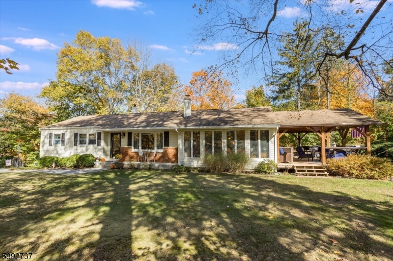 Ranch Home Front Porch and large side covered Deck