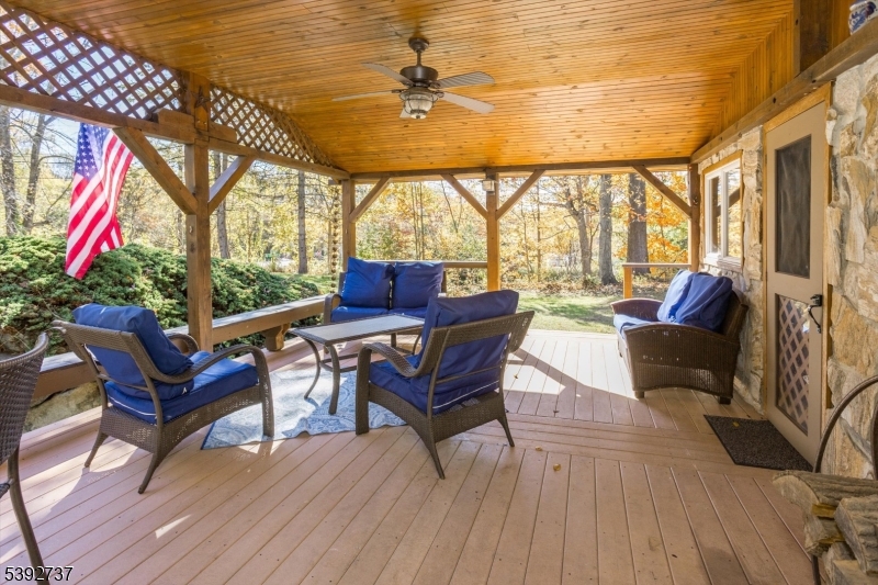 Covered Deck With Wood Planked Ceiling