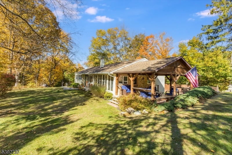 Side View of Yard 2nd Shed is located off to the side