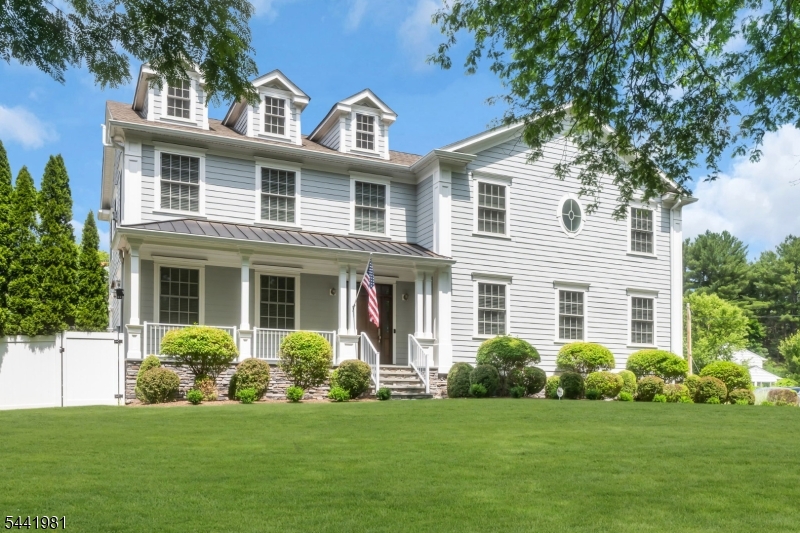 Stunning Rolling Hill Beauty! Located on a level near half acre in the most sought after neighborhood in Chatham!