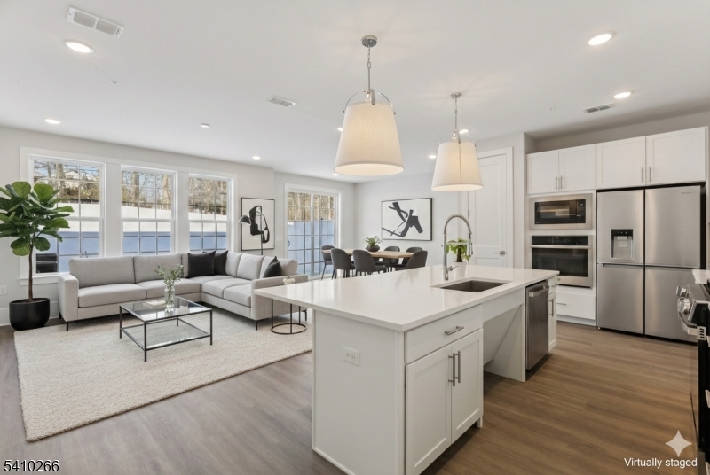 Virtually Staged Open Kitchen with Living and Dinning Room!