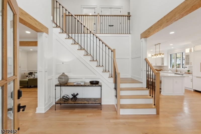 Welcome Home!  Gracious and airy entry foyer introducing a warm and neutral palette in this inviting home.